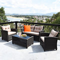 Four Piece Rattan Lounge Set with Armrest Table