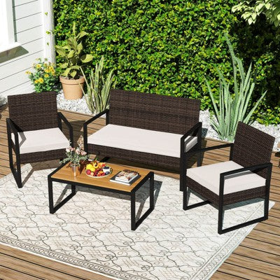 Four Piece Patio Set with Woven Chairs and Table